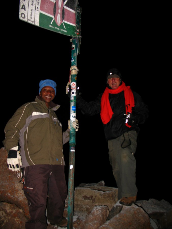 The summit of Mount Kenya ... first ones of the day (early morning) and I am bitterly cold.