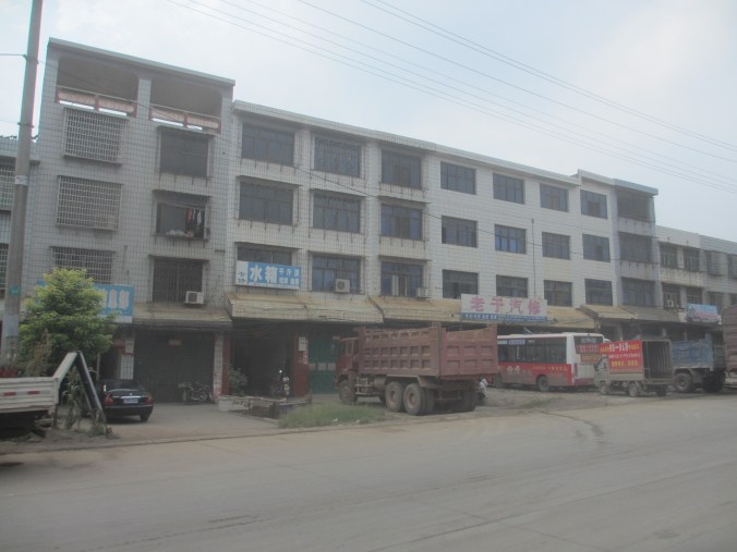 Wjilst the countryside is lush and charming, the towns and cities which number into the tens of thousands and growing are ugly, noisy, dusty and boring concrete jungles. 