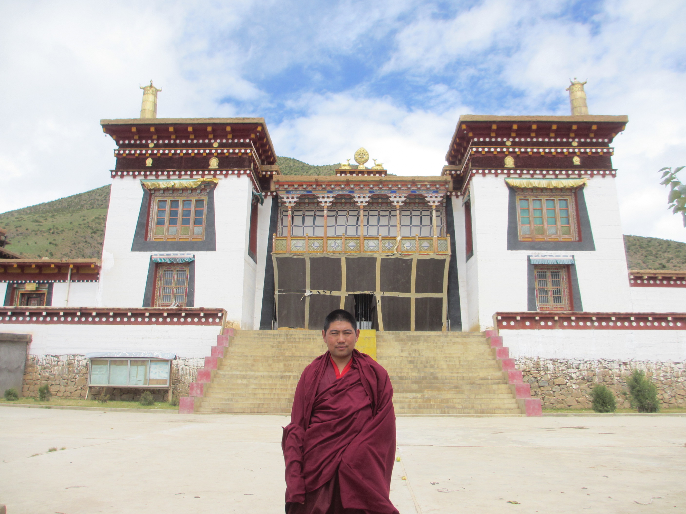 Our very good friend , Si Ba outside his monastery. We later met him again in Lhasa