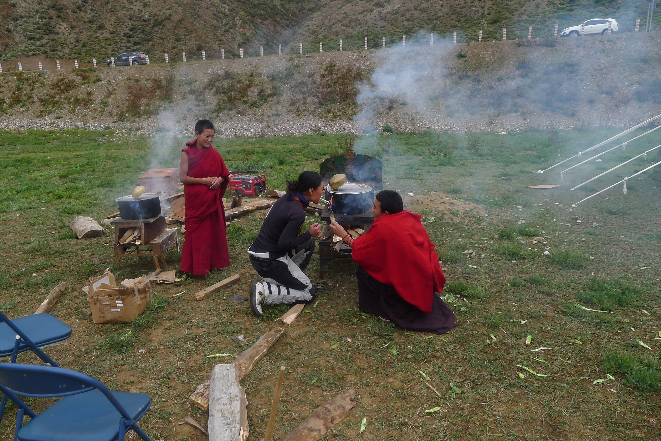 Fanny lighting up a tab from the sacred flame... 