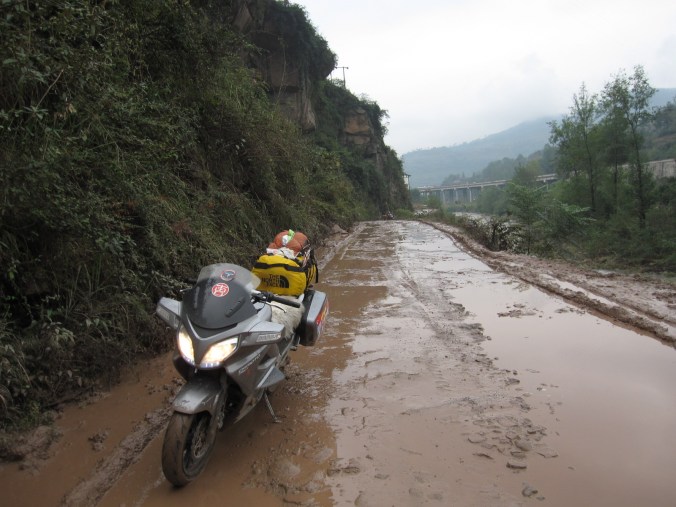 Waiting for Fanny .. who is enjoying herself in the mud