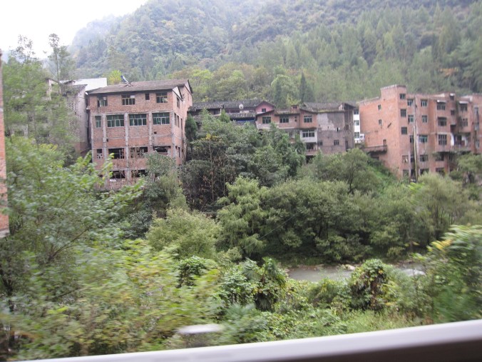 Forget at Fengdu, this is the real ghost town in Chongqing. We rode past it in the middle of the forest and it seemed completely deserted. 