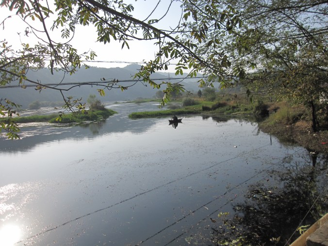 Having our dinner next to the lake and watching the local fishermen in their small boats