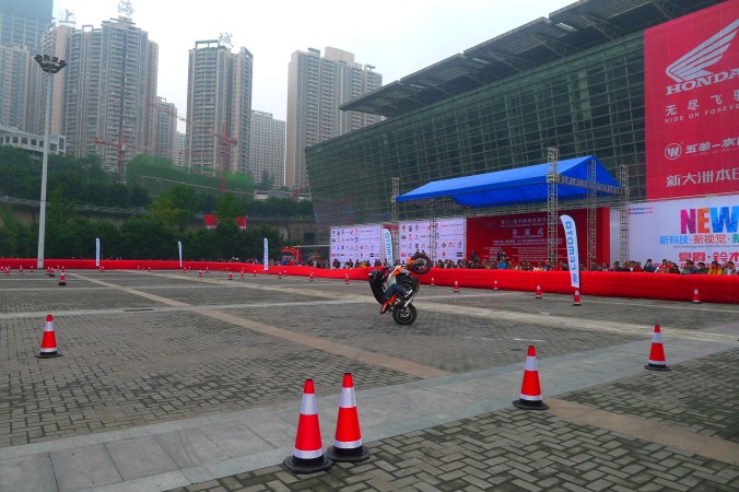 Yes.. a wheelie.. but not from Rupert, but from Hu Hai who really knows what he's doing. 