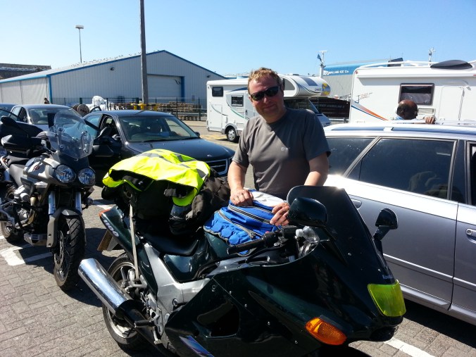 Taking ferry over to Isle of Skye with the other bikers. This biker from Durham, who lives on Skye introduced to me and gave me a can of  Avon skin cream all the locals use to ward off the scary Scottish midges.... its really does work. thanks..